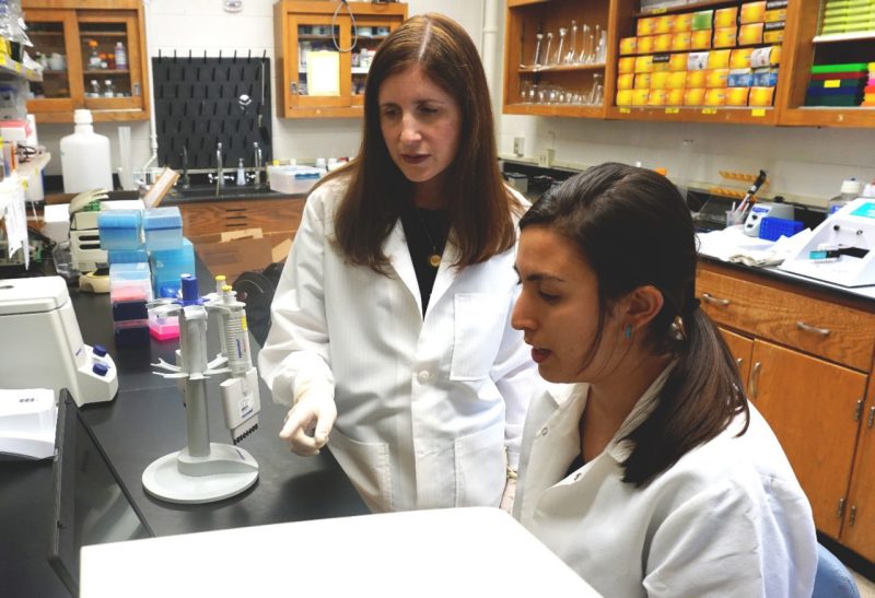 Dana Hawley and  Ariel Leon inside Hawley's lab 