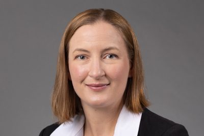 portrait of woman in black and white suit