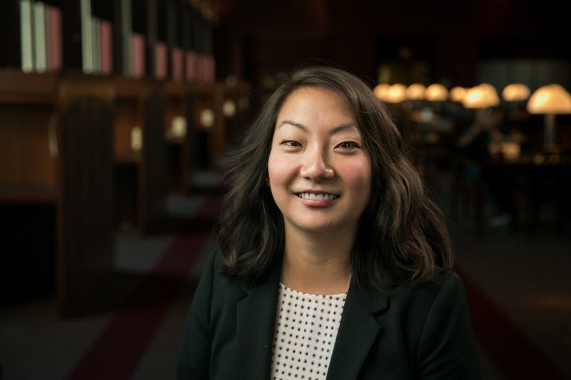 Alicia with black blazer in Torgersen Bridge library