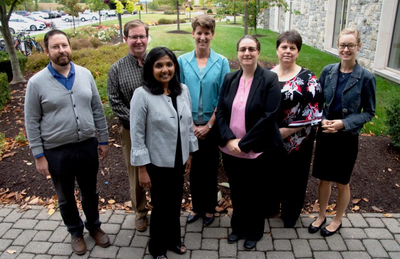 Sally Morton with six award recipients for the College of Science outside of the Inn at Virginia Tech