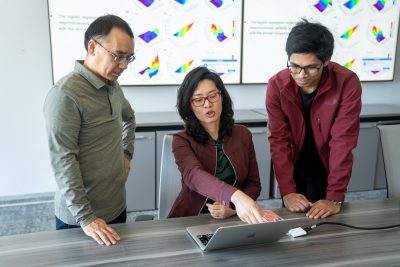  Xinwei Deng, Danfeng "Daphne" Yao, and Tanmoy Sarkar Pias looking at computer