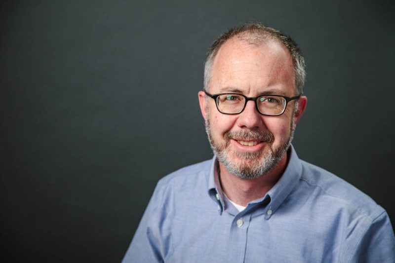 Mark portrait with dark gray background