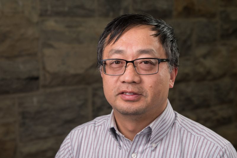 Shuhai portrait in front of Hokie stone background