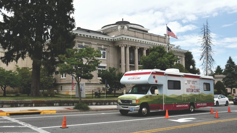 Mobile Autism Clinic RV drives past the courthouse in Marion, VA